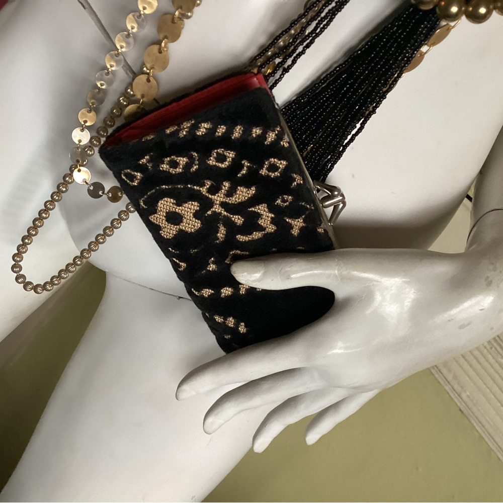 Vintage carpet and red wallet